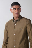 Camisa unicolor en algodón manga larga con bolsillo
