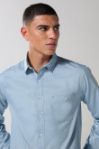 Camisa unicolor en algodón manga larga con bolsillo
