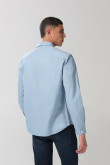 Camisa unicolor en algodón manga larga con bolsillo