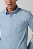 Camisa unicolor en algodón manga larga con bolsillo
