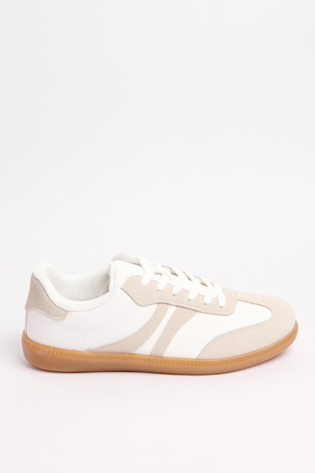 Tenis unicolores tipo casuales con contrastes y perforaciones