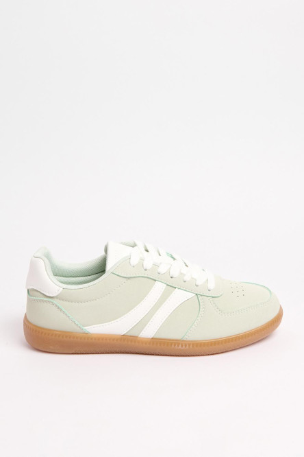 Tenis unicolores tipo casuales con contrastes y perforaciones