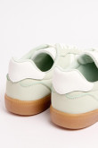 Tenis unicolores tipo casuales con contrastes y perforaciones