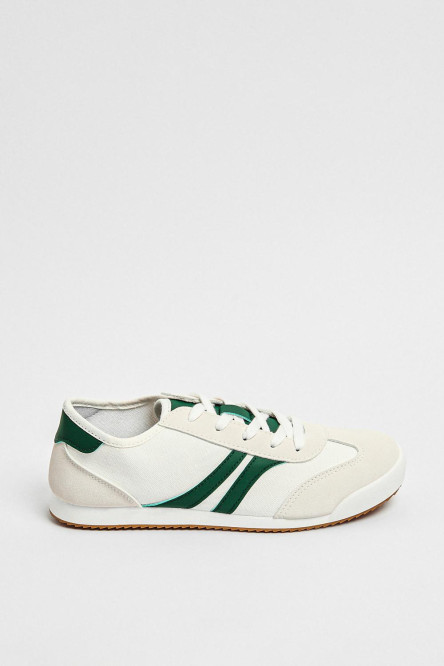 Tenis tipo casuales unicolores con contrastes laterales