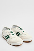 Tenis tipo casuales unicolores con contrastes laterales