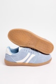 Tenis unicolores tipo casuales con contrastes y perforaciones
