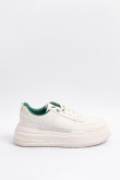Tenis casuales cremas con texturas perforadas y contrastes