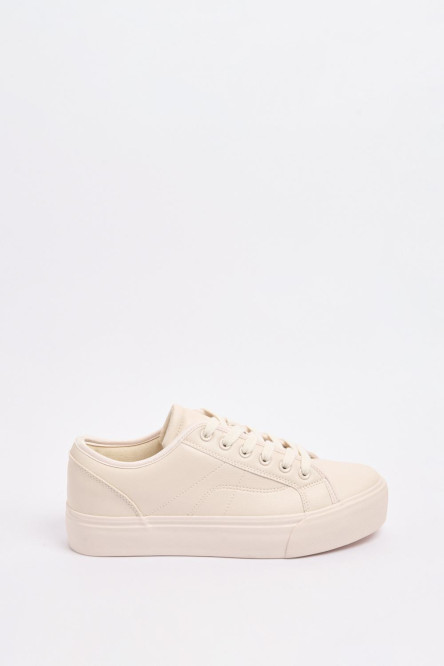 Tenis cremas claros casuales con suelas planas elevadas