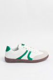 Tenis casuales blancos con contrastes verdes localizados
