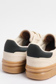 Tenis unicolores casuales con contrastes y cortes