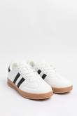 Tenis casuales blancos con contrastes negros localizados