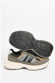 Tenis de plataforma verdes oscuros con cortes en contraste