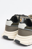 Tenis de plataforma verdes oscuros con cortes en contraste