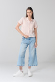 Blusa unicolor manga corta a rayas con bolsillo
