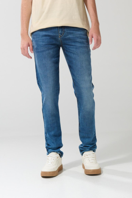 Jean skinny azul con tiro bajo, desgastes y ajuste ceñido