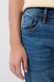 Jean skinny azul con tiro bajo, desgastes y ajuste ceñido