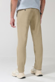 Pantalón slim unicolor en dril con bolsillos y tiro medio