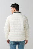 Chaqueta acolchada cuello alto unicolor con cremallera