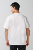 Camiseta cuello redondo unicolor con diseño de playa