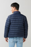 Chaqueta cuello alto unicolor acolchada con cremallera