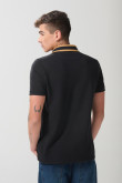 Camiseta polo azul intensa con puños y cuello en rectilíneo