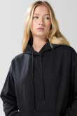 Buzo capota femenino oversize unicolor