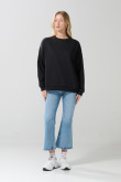 Buzo cuello redondo oversize unicolor con manga larga