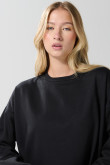 Buzo cuello redondo oversize unicolor con manga larga