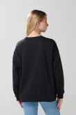 Buzo cuello redondo oversize unicolor con manga larga