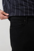 Jean slim negro tiro bajo con ajuste ceñido y bolsillos
