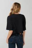 Camiseta negra oversize crop top con arte de Harry Potter