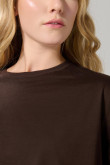 Camiseta crop top oversize unicolor con diseño de osito