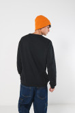 Buzo cuello redondo unicolor con diseño de Looney Tunes