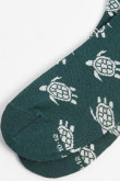 Medias verdes oscuras cortas con diseños de tortugas