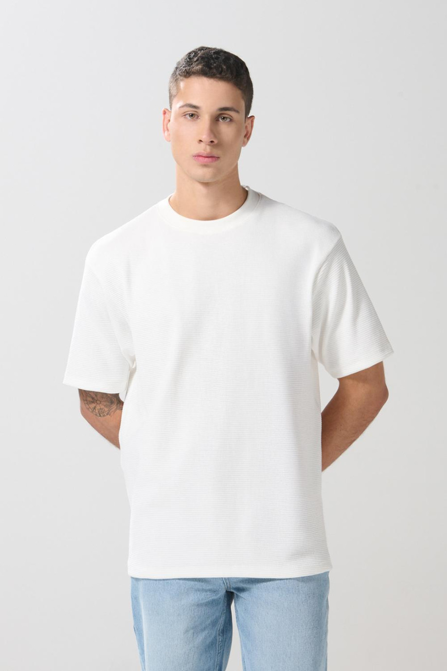 Camiseta unicolor oversize manga corta con texturas