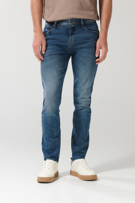 Jean slim azul oscuro tiro bajo con desgastes y arrugas