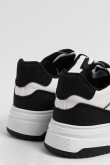 Tenis casuales unicolores con cordones y contrastes