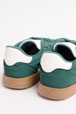 Tenis casuales unicolores con suelas planas en relieve