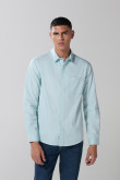 Camisa en algodón unicolor cuello sport collar con bolsillo