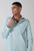Camisa en algodón unicolor cuello sport collar con bolsillo