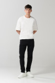 Jean negro skinny con tiro bajo, cremallera y ajuste ceñido