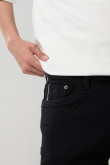 Jean negro skinny con tiro bajo, cremallera y ajuste ceñido