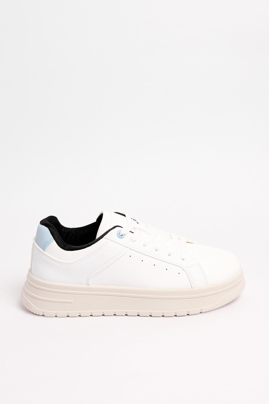 Tenis unicolores casuales con forro interno en contraste