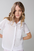 Blusa unicolor en algodón manga corta con bolsillo