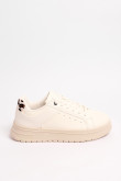 Tenis cremas casuales con diseño animal print posterior