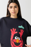 Buzo crop top azul intenso con diseño de Plaza Sésamo