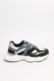 Tenis verdes oscuros de plataforma con cortes en contraste