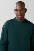 Buzo perchado unicolor cuello redondo oversize