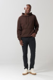 Jean slim gris oscuro tiro bajo con ligeros desgastes