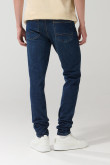Jean skinny azul con ajuste ceñido, cremallera y tiro bajo